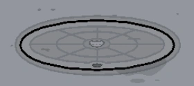 Closed manhole cover on the Bop City storage centre floor