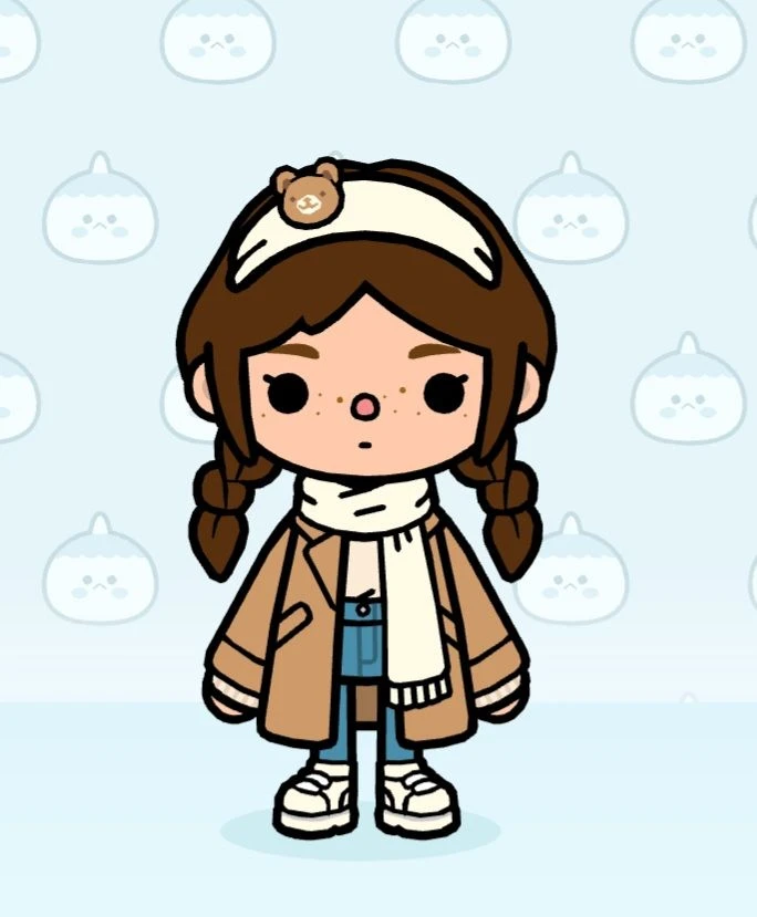 Tan overcoat with cream scarf and bear-clip headband
