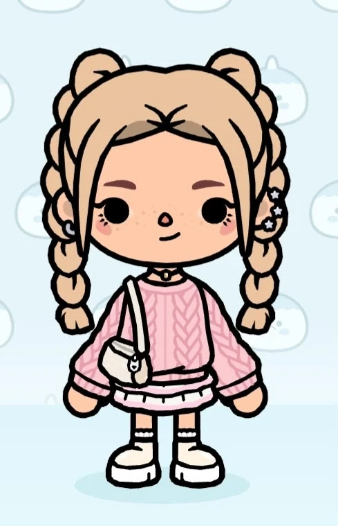Braided buns with pink cable knit and chunky white boots
