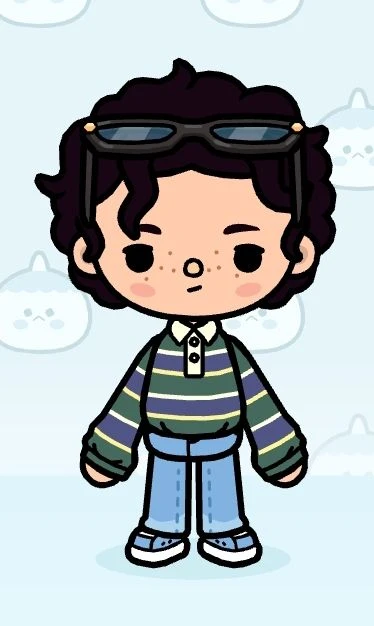 Striped layered top with blue jeans and sunglasses on head